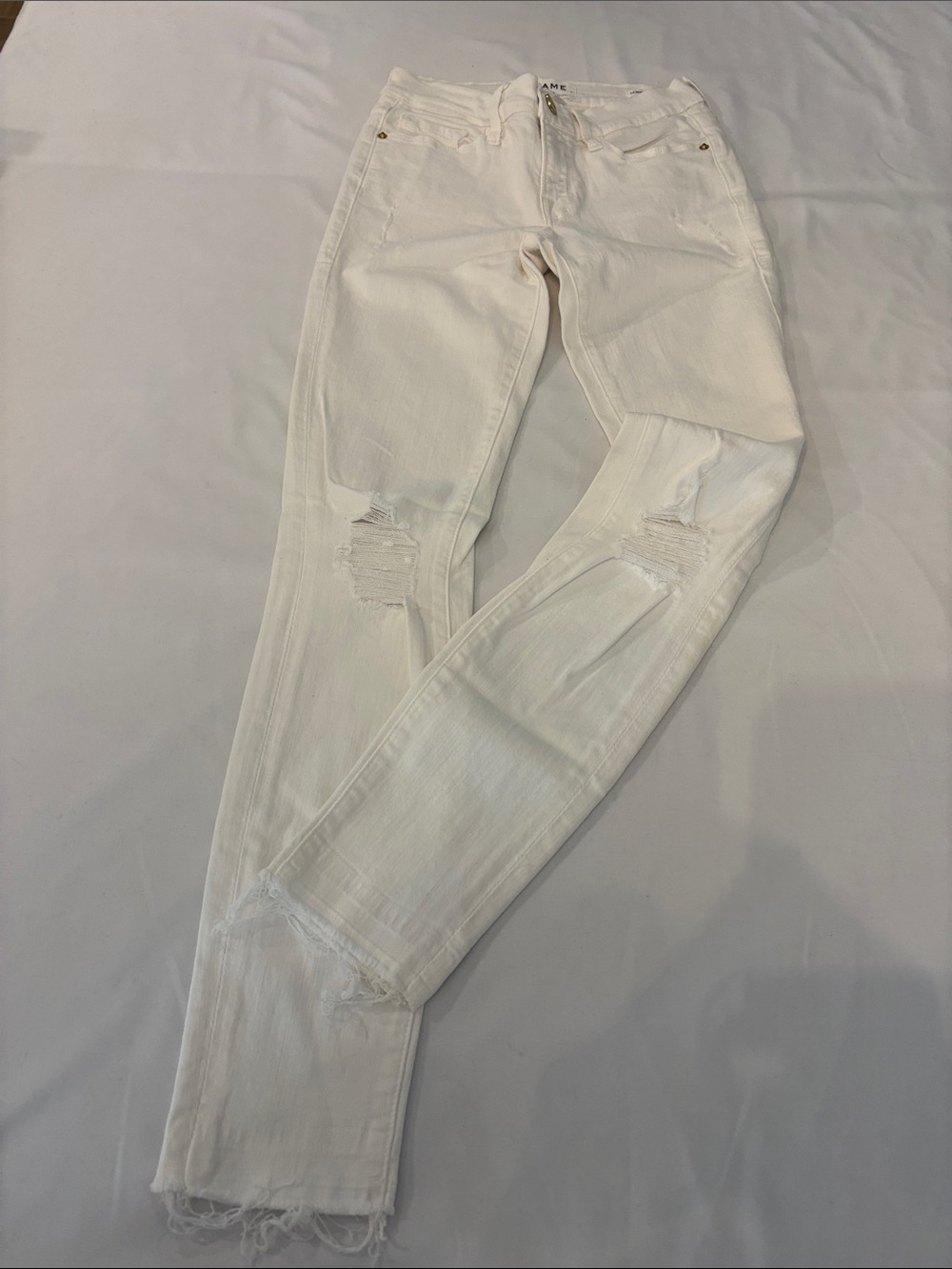 Women’s White FRAME distressed frayed hem skinny jeans - size 24